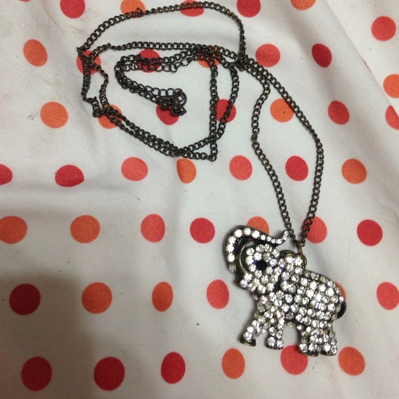 Elephant pendant w/different designs on each side