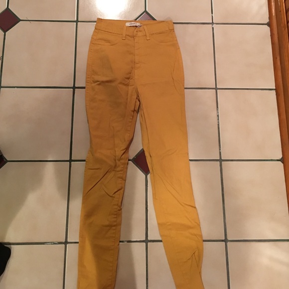 Yellow skinny high waisted jeans