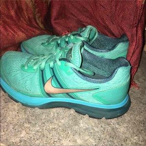 Limited edition gold swoosh Nikes