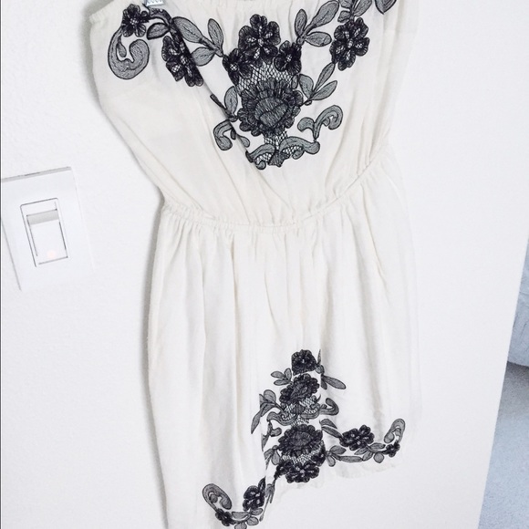 Black and white embroidered strapless