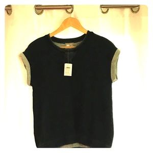 A blue denim top from GAP with short sleeves.