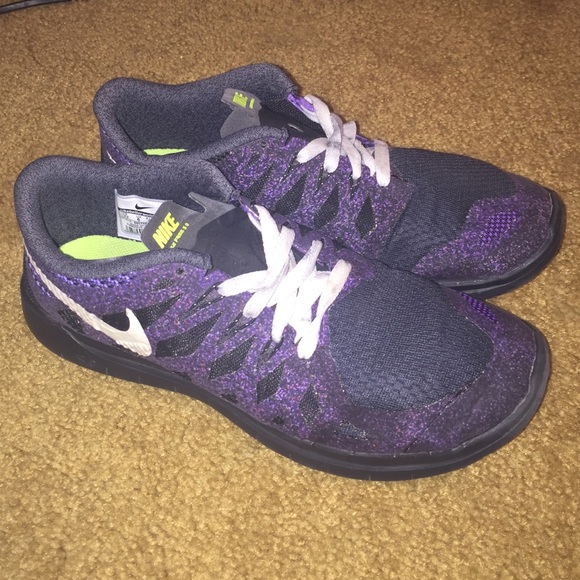 Purple Nike free 5.0 shoes