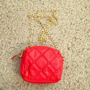 Deux Lux red purse with gold chain strap