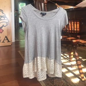 gray shirt with leave detailing