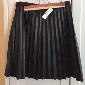 Never worn black faux leather skirt