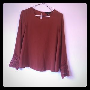 Atmosphere brand burnt orange color blouse. Size 4