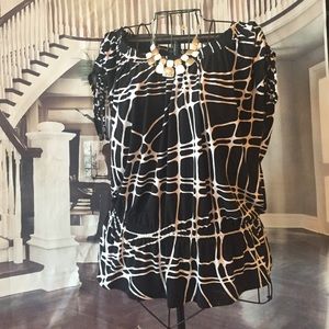 Great top for work or night out.