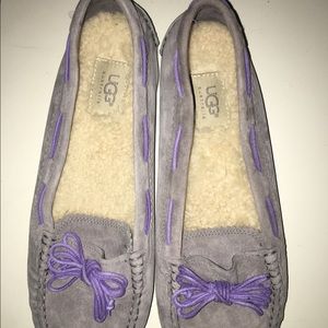 Grey Ugg moccasins with purple laces