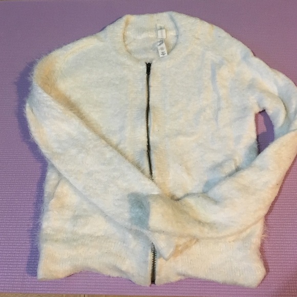 White furry jacket. Aero Bethany Motto collection.