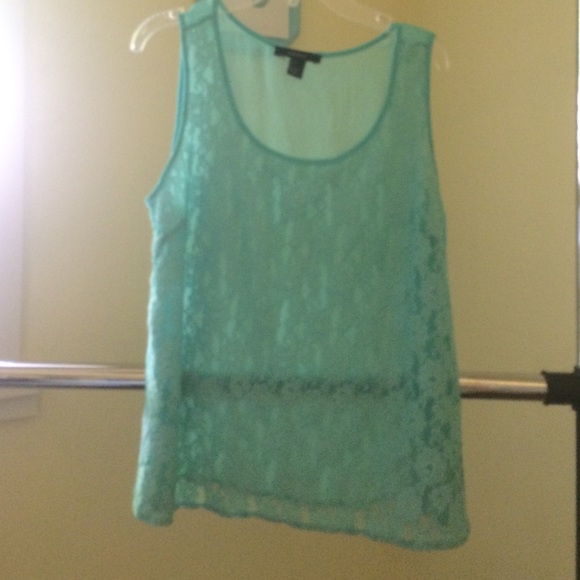 Sheer top with lace floral design