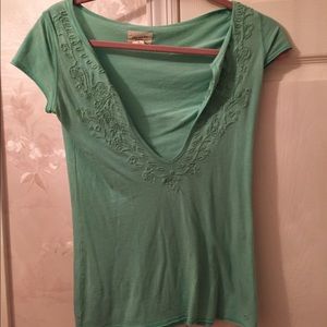 green v-neck