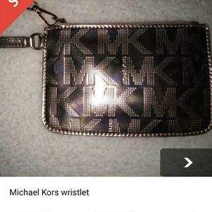 Michael kors rose gold wristlet