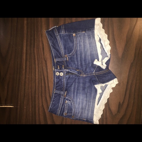 Denim shorts with lace trim