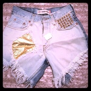 Frayed studded and bleached shorts