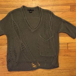 Oversized sweater with distressed holes