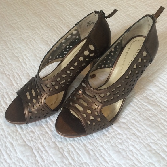 Bronze leather laser cutout peep-toe shoe