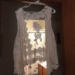 Cream colored shear vest