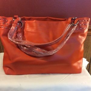 Orange silver studded tote bag