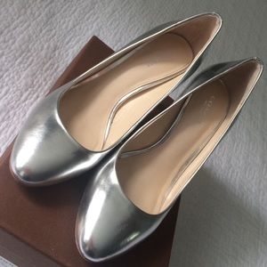 Silver metallic rounded toe pump by Coach