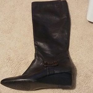 Calvin Klein black leather boots.