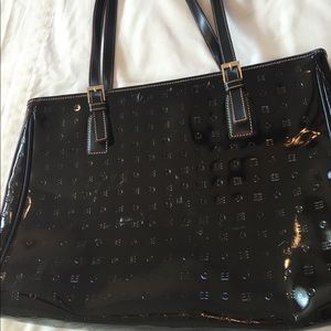 Arcadia black patent leather handbag.