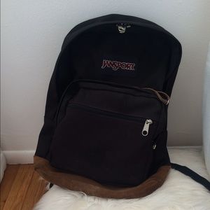 Black and faux suede Jansport backpack