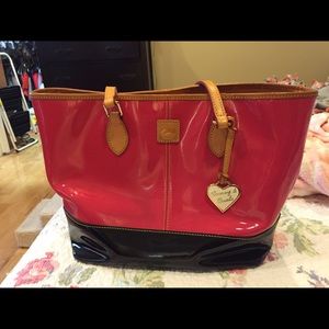 Dooney & Bourke large pink and black purse.