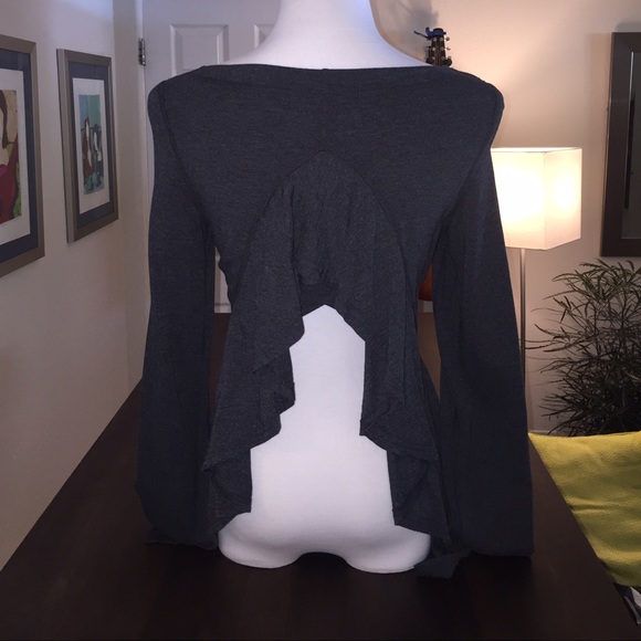 Karma open back/ ruffle top