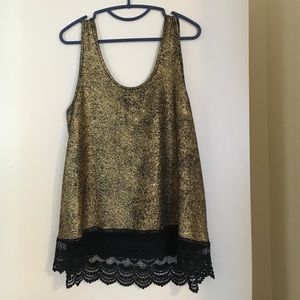 Gold and black tank