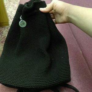 A brand name medium size (bag) THE SAK