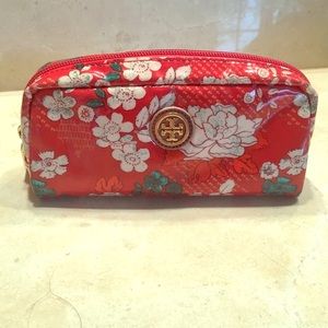 Tory Burch classic floral cosmetic case.