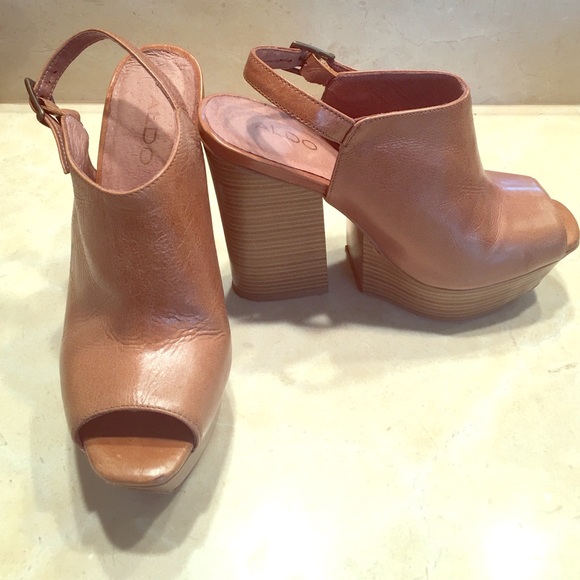 Platform sandals by Aldo