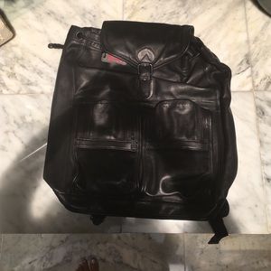 Tumi leather backpack