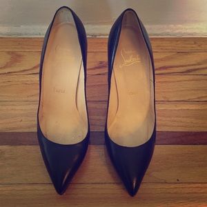 Classic black Christian Louboutin high heels.