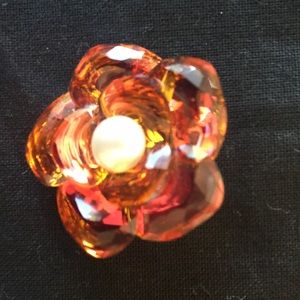 Flower brooch in glass with pearl  centre.