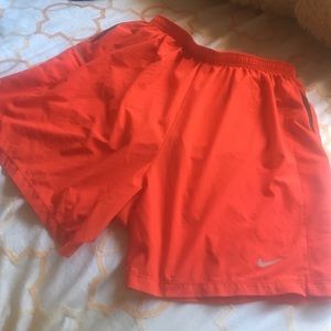 Red Nike dri-fit shorts