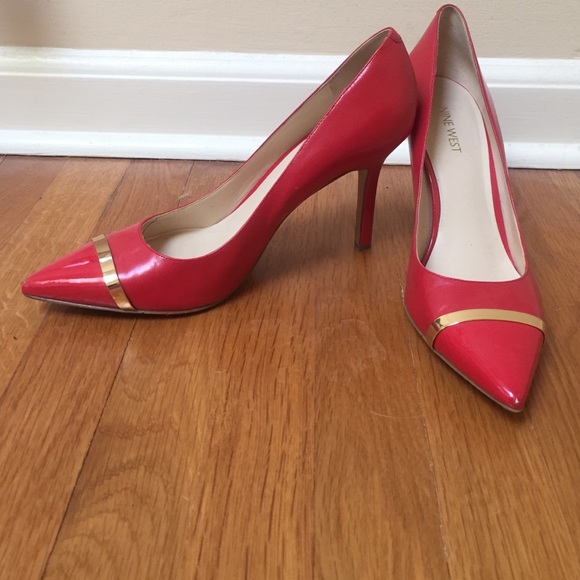 Red leather pumps with gold detail