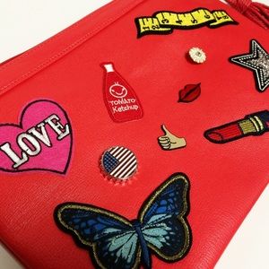 Cherry Patched up Wrist Clutch Bag
