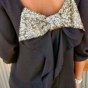 Black sheer top with sequins bow in back
