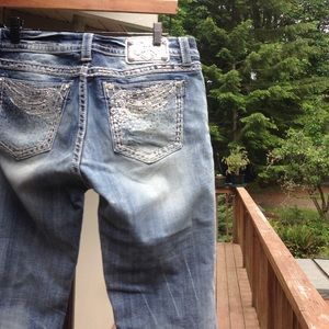 Mid rise easy crop jeans distressed