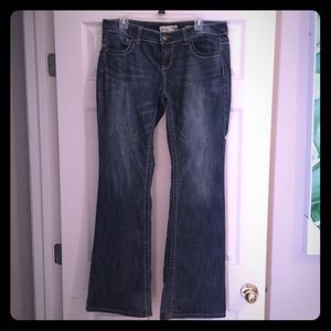 Distressed blue jeans