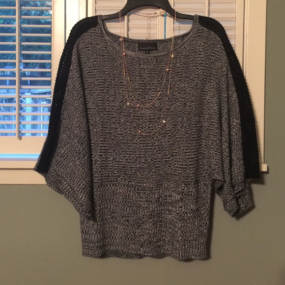Gorgeous dolman top with crochet sleeves.