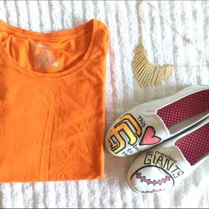 Orange long sleeve top