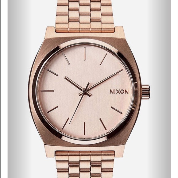 NIXON rose gold time teller watch