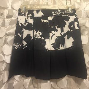 Black and white mini skirt.