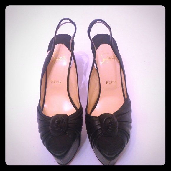 CHRISTIAN LOUBOUTIN HEEL