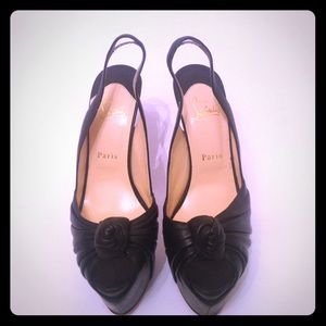 CHRISTIAN LOUBOUTIN HEEL