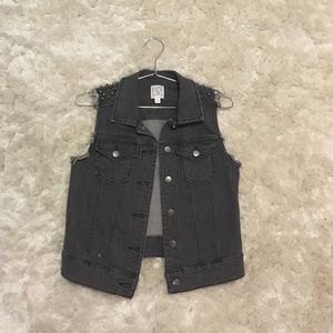 Denim vest with studded shoulders