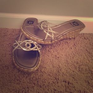 tan and silver woven wedges