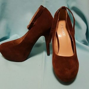 Brown suede pumps